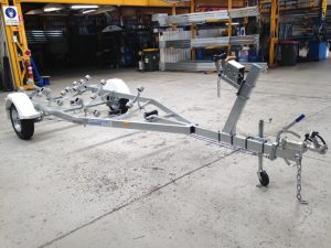 Single Axle braked multi roller boat trailer